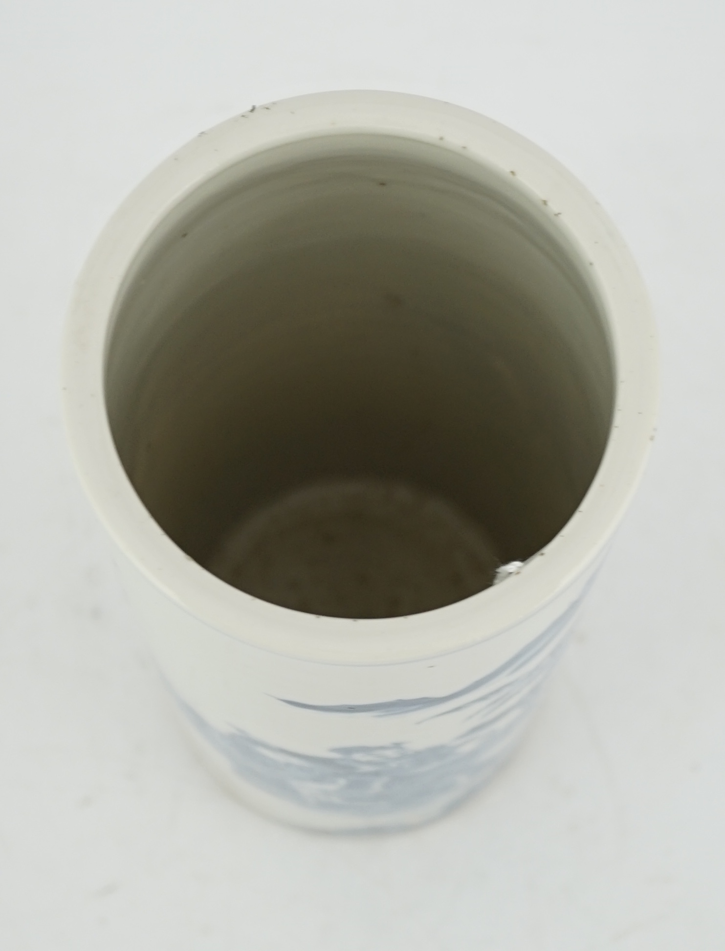 A Chinese blue and white ‘sages’ cylindrical brushpot, 19th century